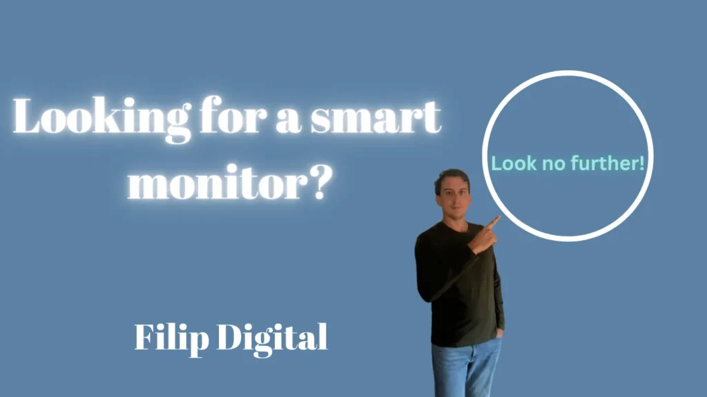 Filip gesturing towards the text "Looking for a smart monitor?" on the left and "Look no further!" on the right, promoting the Samsung M50C Series Smart Monitor.